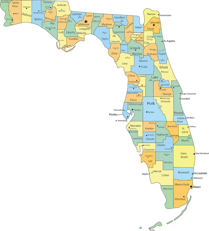Map of Florida showing its counties, each labeled with the county name and major cities or towns. The counties are color-coded in various pastel shades including yellow, green, blue, and orange. Major cities like Tallahassee, Jacksonville, Orlando, Tampa, and Miami are marked with dots. The map outlines the shape of Florida with the panhandle to the northwest and the peninsula extending southward.